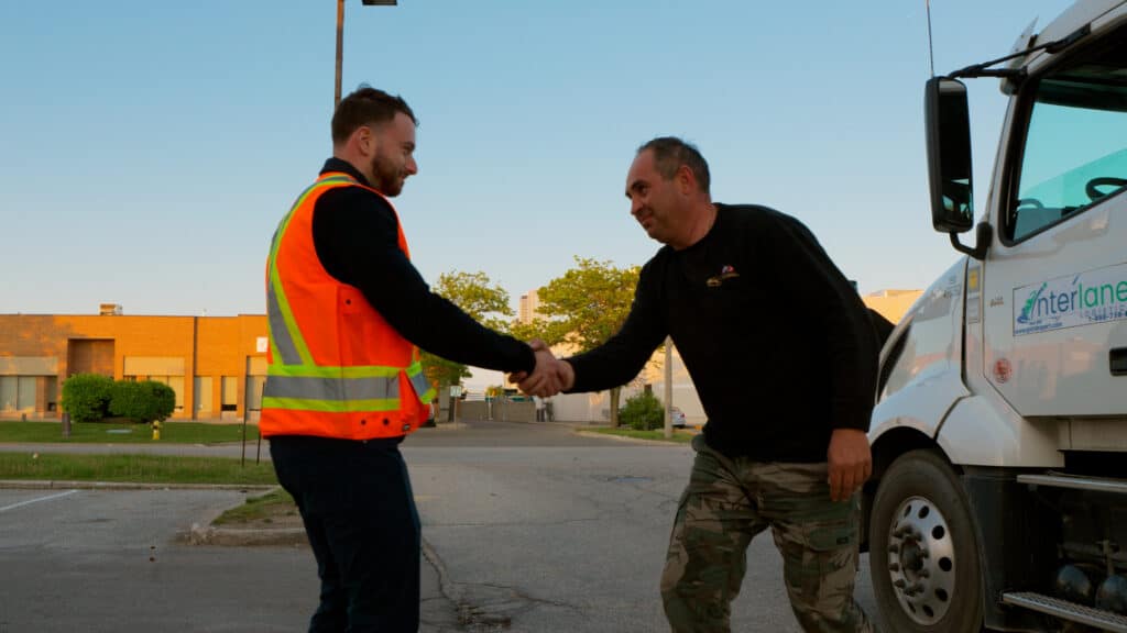 Truck driver handshake